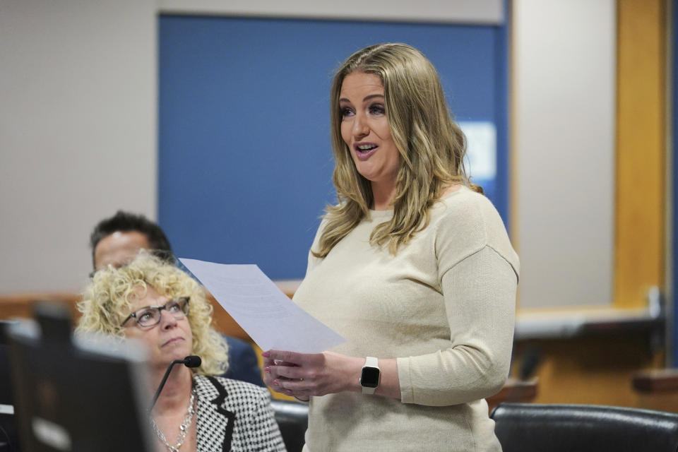 FILE - Jenna Ellis reads a statement inside Fulton Superior Court Judge Scott McAfee's Fulton County Courtroom, Oct. 24, 2023, in Atlanta. Lawyers Ellis and Boris Epshteyn and former U.S. Senate candidate James Lamon on Tuesday, June 18, 2024, pleaded not guilty to nine felony charges for their roles in trying to overturn former President Donald Trump’s Arizona election loss to Joe Biden. (AP Photo/John Bazemore, Pool, File)