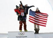 Freestyle Skiing - Pyeongchang 2018 Winter Olympics - Men's Ski Halfpipe Finals - Phoenix Snow Park - Pyeongchang, South Korea - February 22, 2018 - Gold medallist David Wise of the U.S. celebrates with his wife Alexandra and their children Nayeli and Malachi. REUTERS/Issei Kato