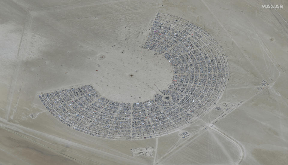 In this satellite photo provided by Maxar Technologies, an overview of Burning Man festival in Black Rock, Nev on Monday, Aug. 28, 2023. (©2023 Maxar Technologies via AP)