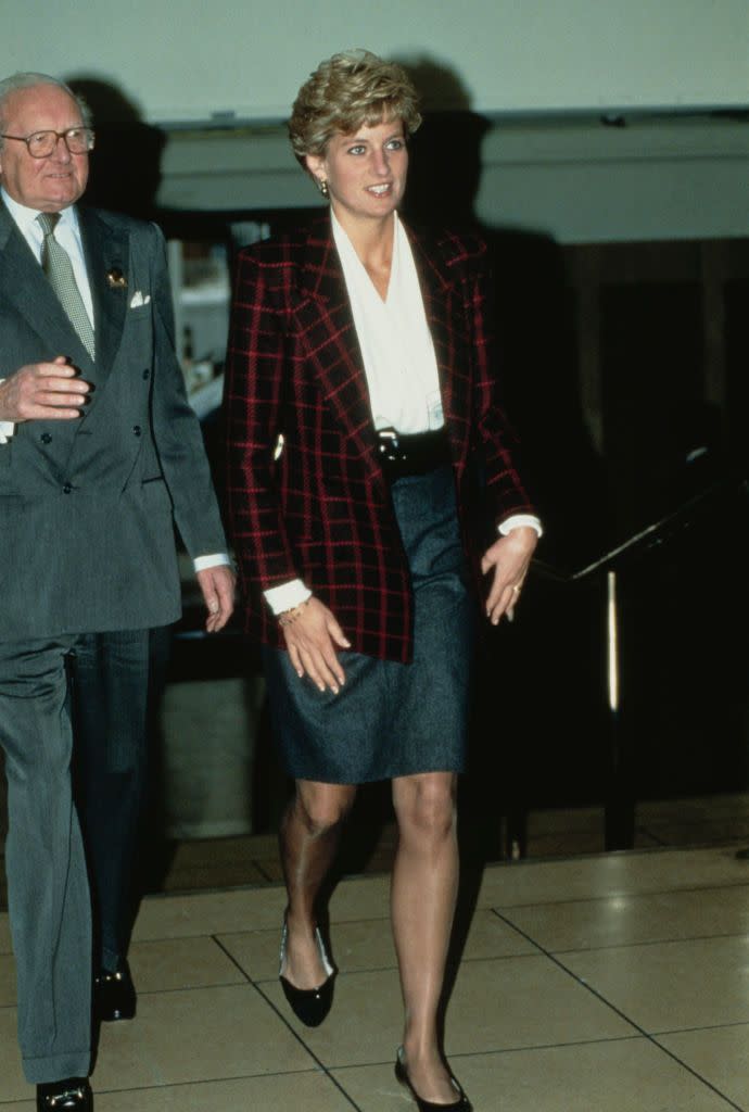 <p>A red check blazer is a perfect choice for the holidays. Diana wore this pick to a horse show during the holiday season in December 1990.<br></p>