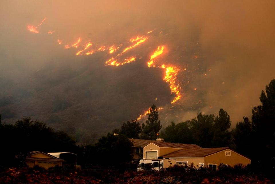 A wildfire at the Cleveland National Forest near homes in Lake Elsinore (AP)