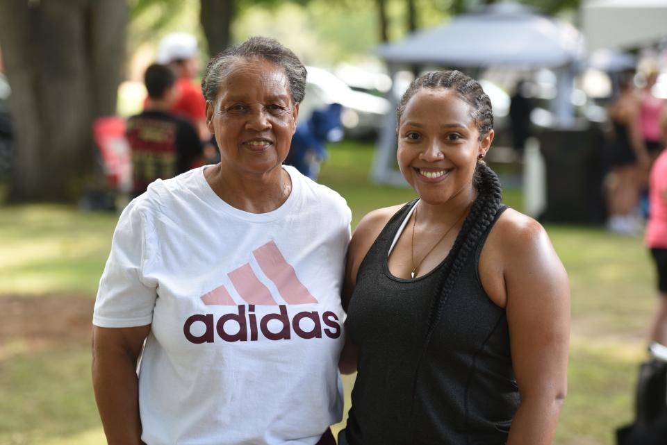 Brittany Banks (right) is seen with her aunt and former tennis coach, Michele Winfield, during the 66th Annual Francis J. Robinson International Memorial Tournament at the Port Huron Tennis House on Thursday.