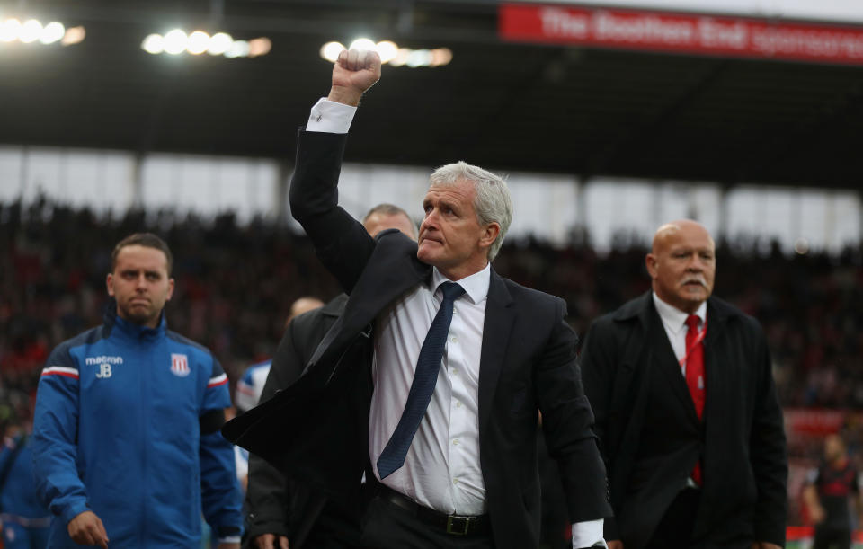 Stoke boss Mark Hughes celebrates at the final whistle