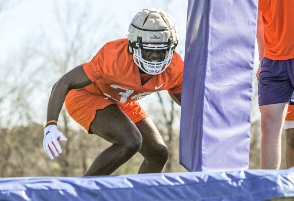 Clemson defensive end Armon Mason (34) hits a pad during a tackle drill during  the second day of spring practice at the football Complex in Clemson, SC Tuesday, March 7, 2023.