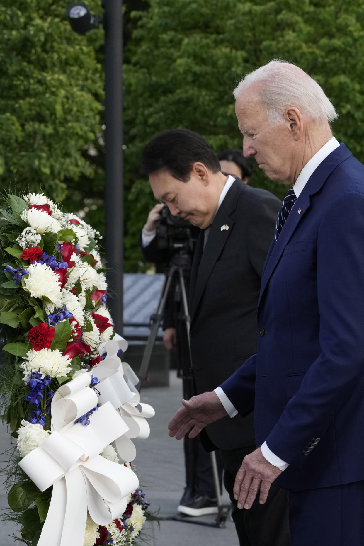 President Joe Biden and South Korea's President Yoon Suk Yeol lay a wreath during a visit to the Korean War Veterans Memorial in Washington, Tuesday, April 25, 2023. (AP Photo/Susan Walsh)