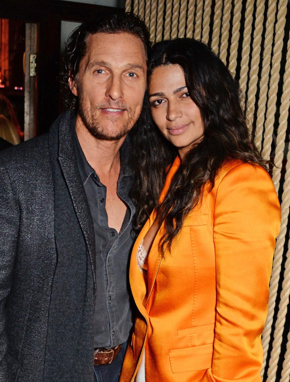 Matthew McConaughey and Camila Alves attend the launch party of new bar The Parrot at The Waldorf Hilton hosted by Idris Elba on November 8, 2018 i