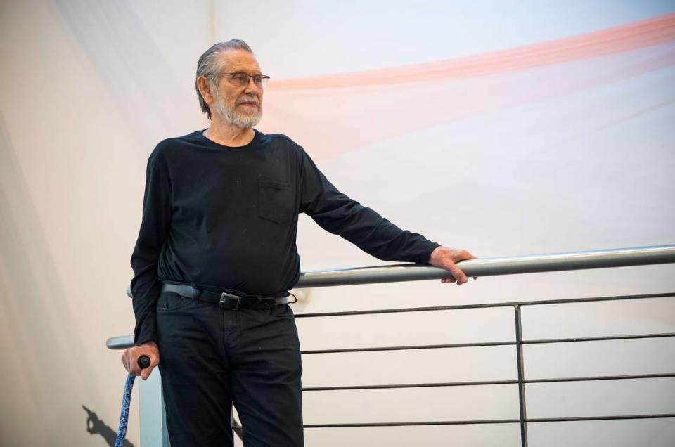 Stephen Kaltenbach, a former Sacramento State professor renowned as a sculptor and conceptual artist, stands near “Epicenter,” his collaboration with Korean-born conceptual and installation artist Seongmin Yoo, at the John Natsoulas Gallery in Davis.