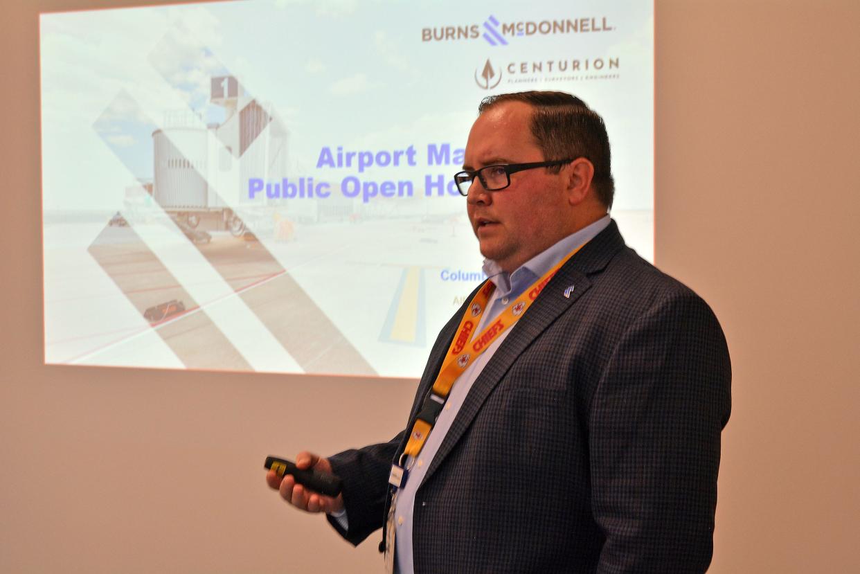 Tom Dowse, Burns and McDonnell project manager, speaks Thursday at Columbia Regional Airport during a public meeting focused on airport master plan updates.