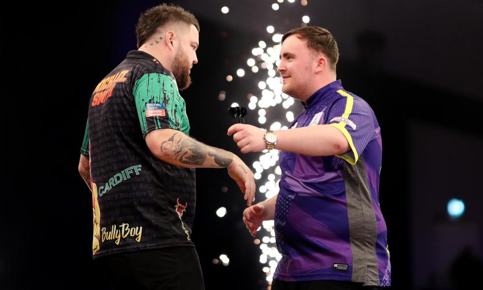 <span>Luke Littler (right) was beaten 6-5 by Michael Smith in the semi-final on the first night of the 2024 Premier League.</span><span>Photograph: Ryan Hiscott/Getty Images</span>
