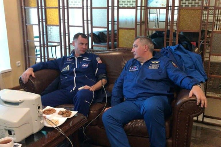 US astronaut Nick Hague, left, and Russian cosmonaut Aleksey Ovchinin after making a safe emergency landing