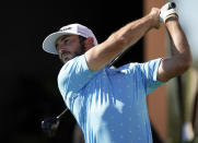 Max Homa tees off on the first hole during the final round of the Genesis Invitational golf tournament at Riviera Country Club, Sunday, Feb. 21, 2021, in the Pacific Palisades area of Los Angeles. (AP Photo/Ryan Kang)