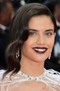 <p>Sara Sampaio stunned with a vampy aubergine lip shade which did the talking for her make-up. Her hair, styled in loose vintage-inspired waves, was side-parted and swept back in a low up-do.</p>