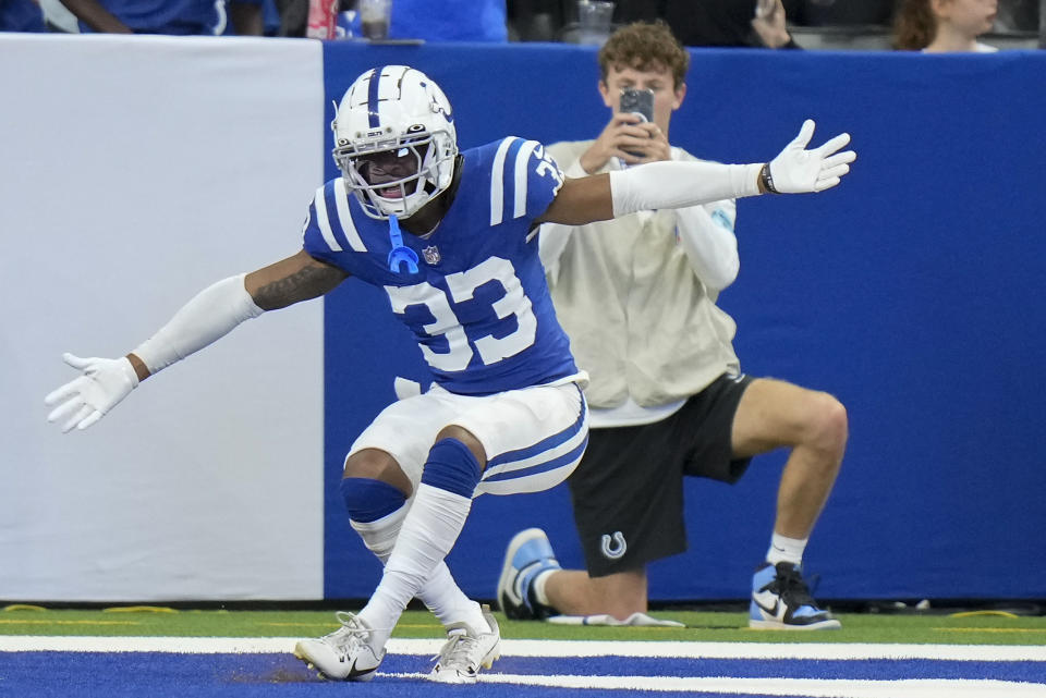 Indianapolis Colts cornerback Micah Abraham (33) reacts after scoring a defensive touchdown against the Denver Broncos during the third quarter of a preseason NFL football game, Sunday, Aug. 11, 2024, in Westfield, Ind (AP Photo/AJ Mast)