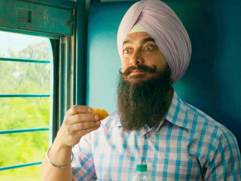 Bollywood actor Aamir Khan — one of the biggest movie stars in the world — stars in Laal Singh Chaddha, a faithful Hindi remake of the 1994 movie Forrest Gump starring Tom Hanks.  (Paramount/The Associated Press - image credit)