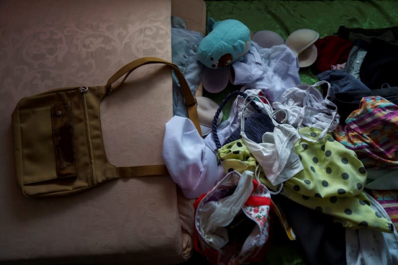The Wider Image: Calls to suicide helpline show Thais' stress in downturn