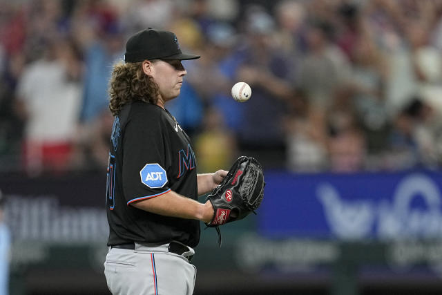 Rangers rally from 5-0 deficit to beat Marlins 9-8