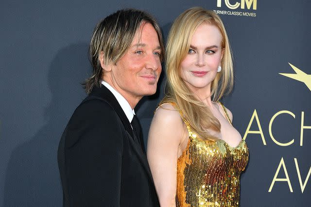 <p>VALERIE MACON/AFP via Getty</p> Keith Urban and Nicole Kidman pose on April 27.