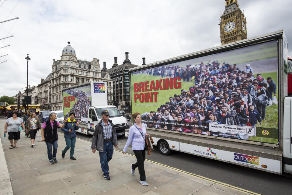 Vans displaying the UK Independence Party's new EU referendum campaign poster near Parliament in June 2016. (Photo: Jack Taylor via Getty Images)