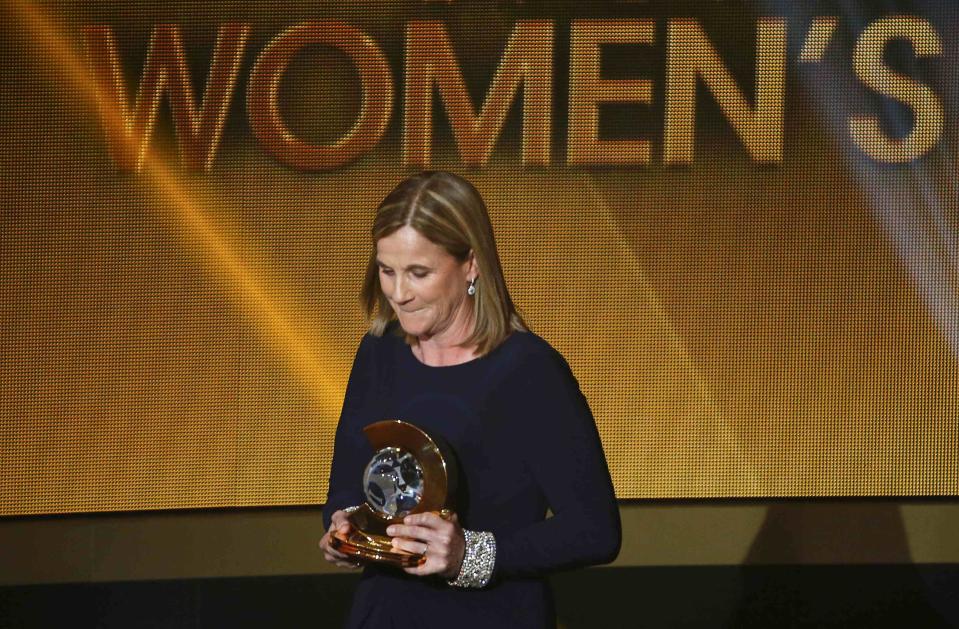 FIFA women coach of the year Ellis of the U.S. holds her award during the Ballon d'Or 2015 awards ceremony in Zurich