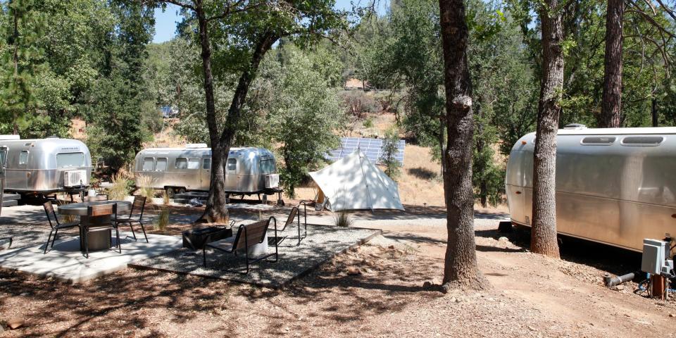 Autocamp Yosemite's Airstream suites by trees and walkways