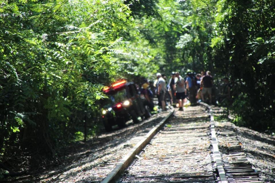 Emergency responders used specialized vehicles to find and rescue a skydiver who landed on railroad tracks in a wooded area behind Norland Cemetery north of Chambersburg on Aug. 19, 2023.