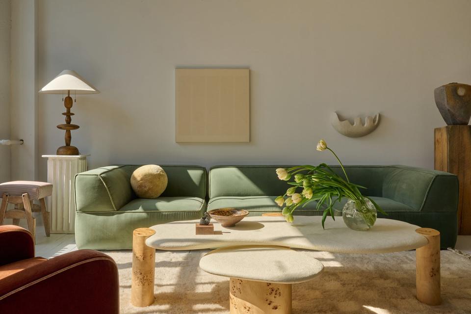 sage green sofa in office