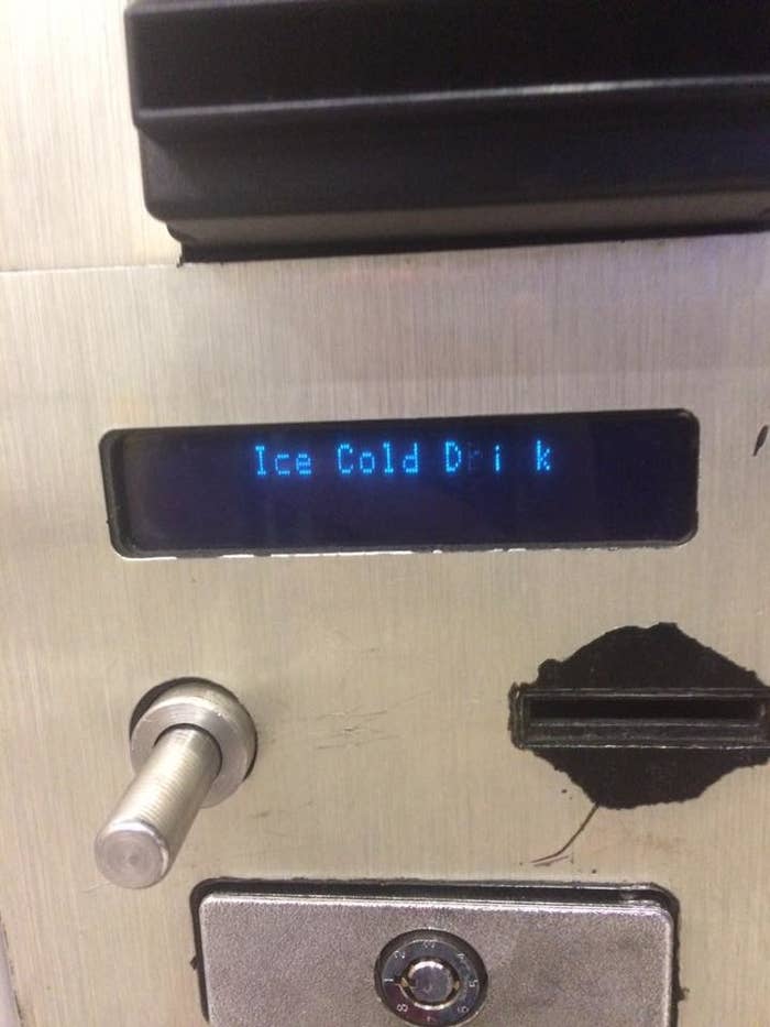 Vending machine button labeled "Ice Cold Drink" but the R and N are dimmed so it spells "dik" instead