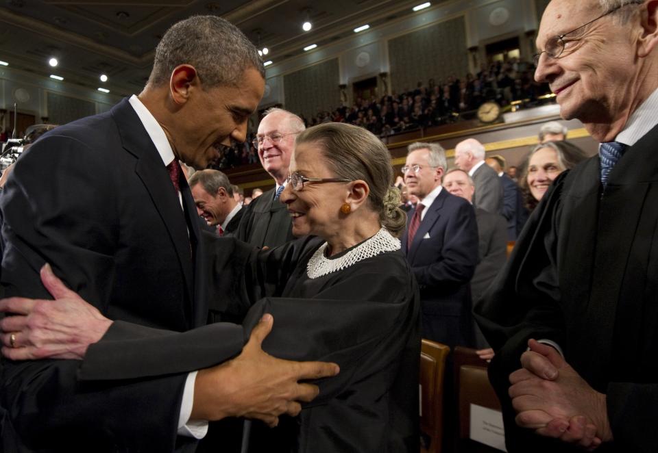 President Barack Obama greets Supreme Court Justice Ruth Bader Ginsburg before his State of the Union address in 2012 (Getty Images)