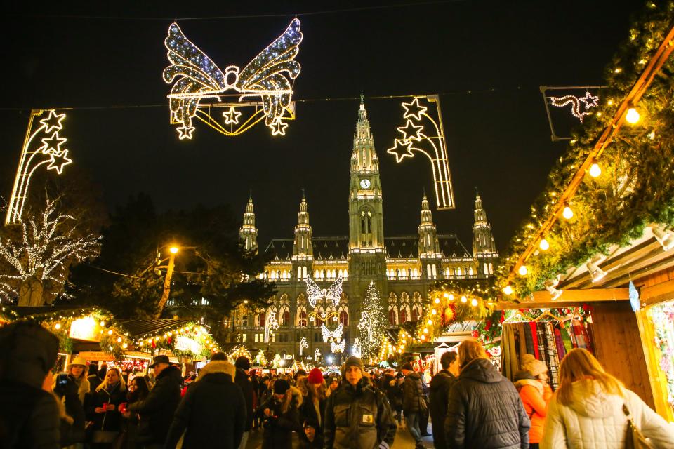 Christmas decorations and traditional Christmas market in front of Viena City Hall in Vienna, Austria.