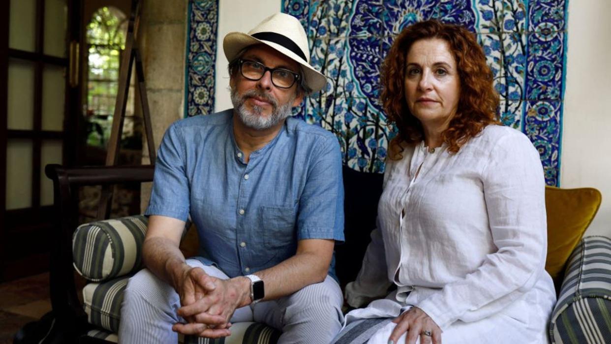 <div>Israeli-American novelist Ayelet Waldman (R) and her spouse American novelist Michael Chabon pose for a picture in Jerusalem on June 18, 2017. (Photo by MENAHEM KAHANA / AFP) (Photo by MENAHEM KAHANA/AFP via Getty Images)</div>