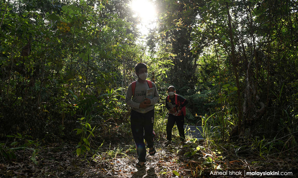 To get to the hut, children must make their way from the main road and make a short trek through the forest to arrive at the clearing.