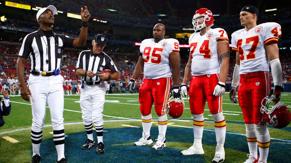 Carey conducts the coin toss prior to a game in 2007 in St. Louis. - G. Newman Lowrance/AP