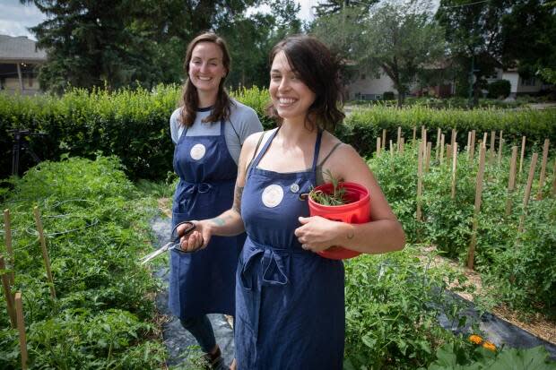 Candace Benson (left) and Miranda Holt co-own and operate City Street Farms in Regina.  (Matt Howard/CBC News - image credit)