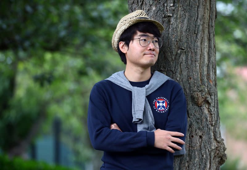 Simon Cheng, a former British Consulate employee, poses for a photograph in London