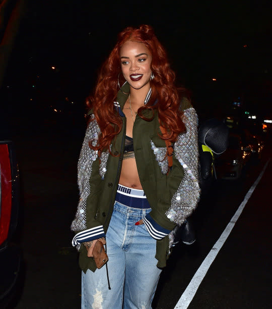 Rihanna wears a sequined jacket, Puma boxer-briefs, and boyfriend jeans on May 25, 2015 in New York City.