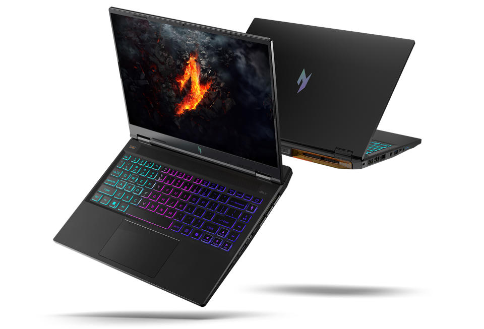 Product marketing image of the Acer Nitro 14 gaming laptop.  Two models float dramatically in the air: one facing forward with a visible screen and keyboard, the other (behind) showing a rear view.  Gray-blue background.