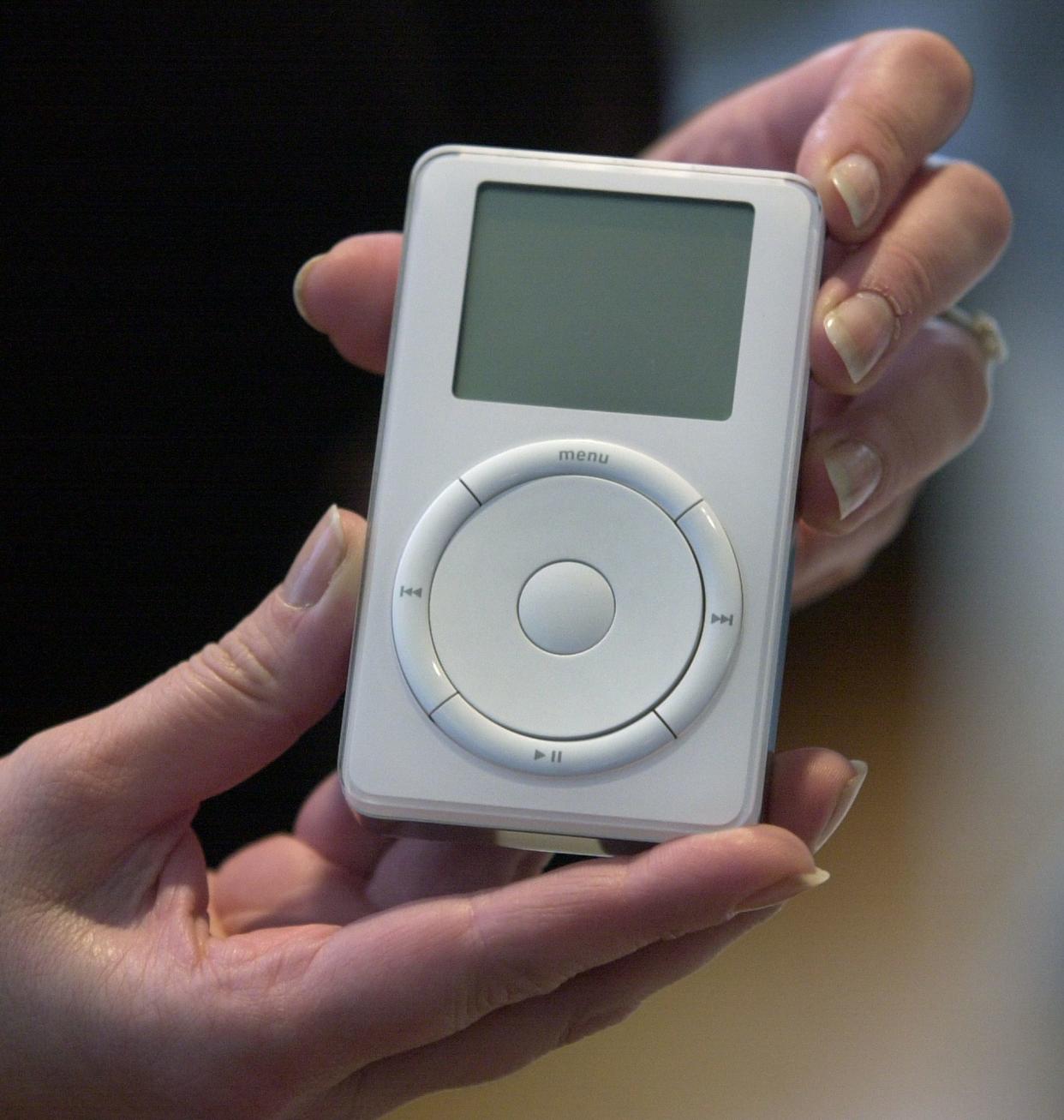 In this Oct. 23, 2001 file photo,  the original iPod is displayed after its introduction by Apple Computer Inc. chief executive officer Steve Jobs during a news conference in Cupertino, Calif.