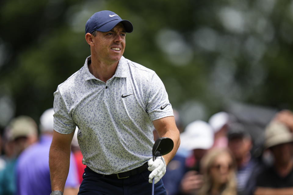 Rory McIlroy watches his tee shot on the first hole during the first round of the Travelers Championship golf tournament at TPC River Highlands, Thursday, June 22, 2023, in Cromwell, Conn. (AP Photo/Frank Franklin II)