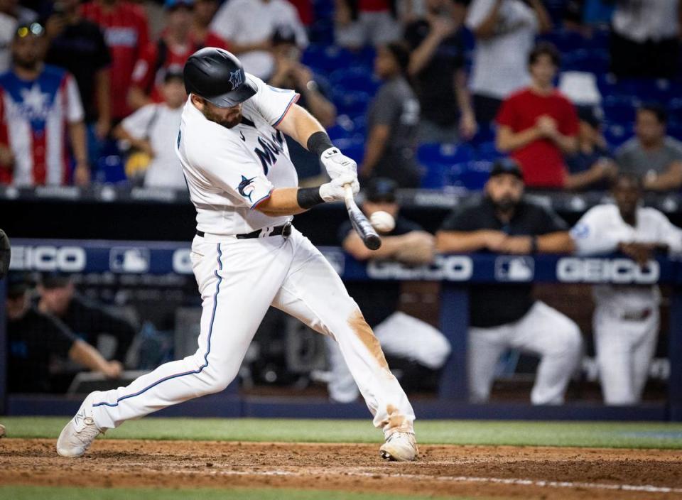 Miami Marlins third baseman Jake Burger (36) hits the game winning walk-off single during the ninth inning of a baseball game against the New York Yankees on Sunday, Aug. 13, 2023, at loanDepot Park in Miami.