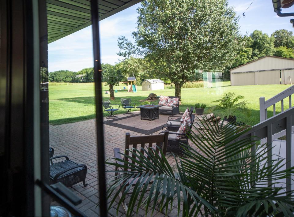 A view of the rear patio from inside Gerald and Dorie Shelburne's home in Louisville. This home is one of 10 on the 2022 Tour of Remodeled Homes. It was named Best Farmhouse Remodel on this year’s tour. Aug. 2, 2022
