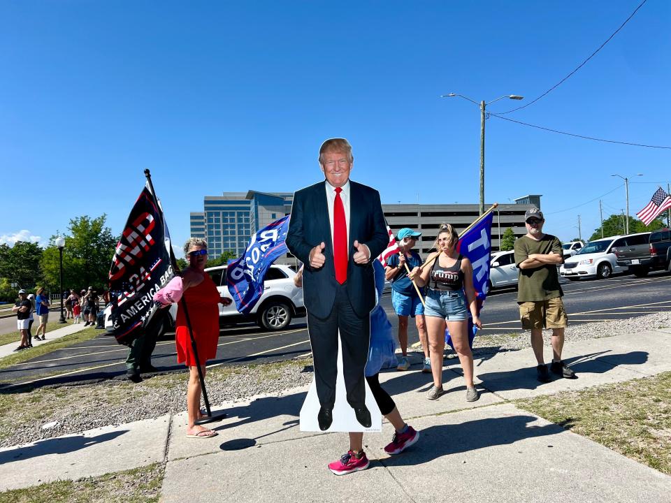 Supporters of Donald Trump arrive outside the Wilmington Convention Center on Thursday.