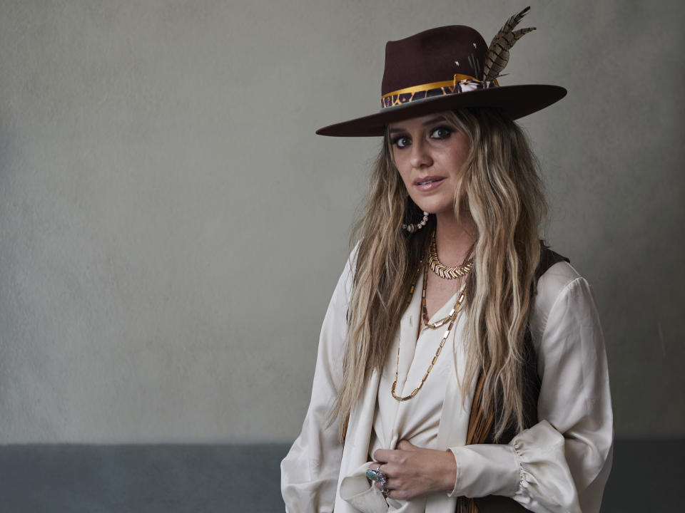 FILE - Country singer-songwriter Lainey Wilson poses for a portrait on Nov. 2, 2022, in New York to promote her album "Bell Bottom Country." Wilson will headline the Country Bay Music Festival scheduled for Nov. 11-12 at the historic Miami Marine Stadium in Biscayne Bay, Fla. (Photo by Matt Licari/Invision/AP, File)