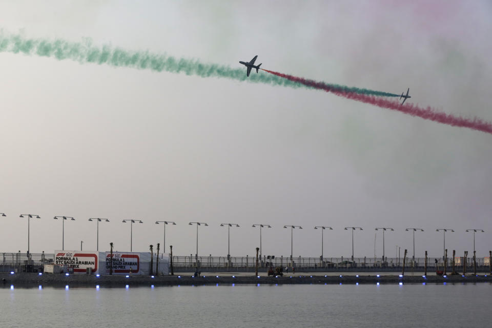 The Saudi Hawks aerobatic team perform over the Formula One corniche circuit, in Jiddah, Saudi Arabia, Sunday, Dec. 5, 2021. (AP Photo/Amr Nabil)