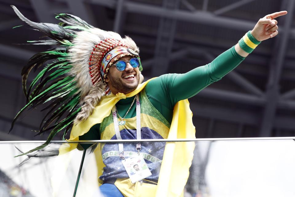 <p>Brazil fans have a half-time festival as they away their team’s return </p>