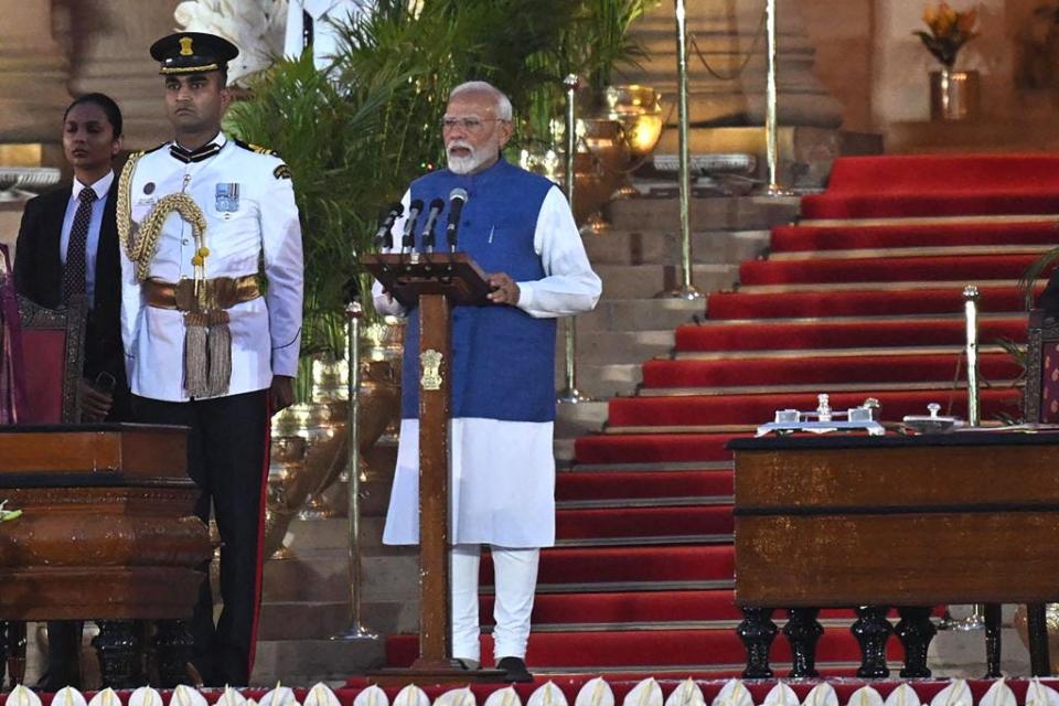 India's Bharatiya Janata Party (BJP) leader Narendra Modi takes the oath of office as the country's prime minister during the oath-taking ceremony at the Rashtrapati Bhavan presidential palace in New Delhi on June 9, 2024. Indian Prime Minister Narendra Modi is expected to sworn in for a third term on June 9 after worse-than-expected election results left him dependent on coalition partners to govern.  (Photo by Money SHARMA / AFP) (Photo by MONEY SHARMA/AFP via Getty Images)