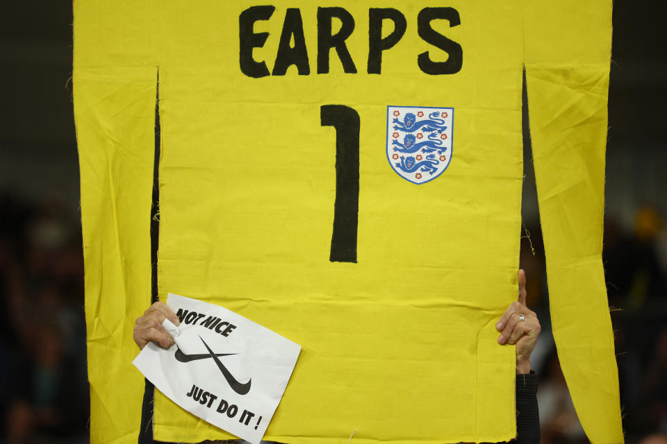 Soccer Football - FIFA Women’s World Cup Australia and New Zealand 2023 - Quarter Final - England v Colombia - Stadium Australia, Sydney, Australia - August 12, 2023 A fan holds up a banner for England's Mary Earps REUTERS/Carl Recine