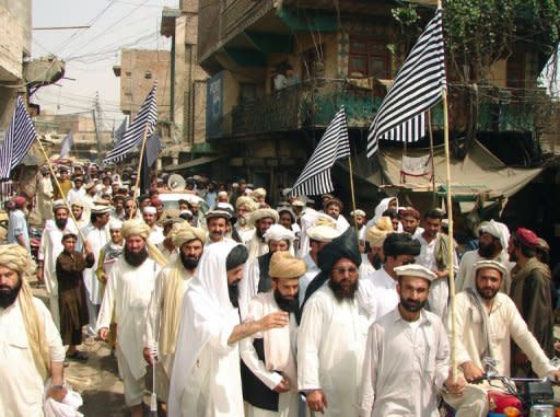 Pakistani tribesmen protest in Miranshah, the main town in North Waziristan district in June 2011, against US drone attacks in Pakistani tribal areas. Washington has called Pakistan's semi-autonomous tribal region where Rahman died the global headquarters of Al-Qaeda, where Taliban and other Al-Qaeda-linked networks plot attacks on NATO forces in Afghanistan