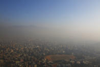 In this Tuesday, Dec. 11, 2018 photo the smog ridden Kathmandu city is seen atop of hill in Kathmandu, Nepal. (AP Photo/Niranjan Shrestha)