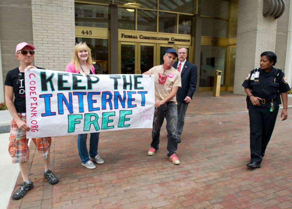 Supporters of net neutrality outside the FCC in 2014. AFP/Getty Images