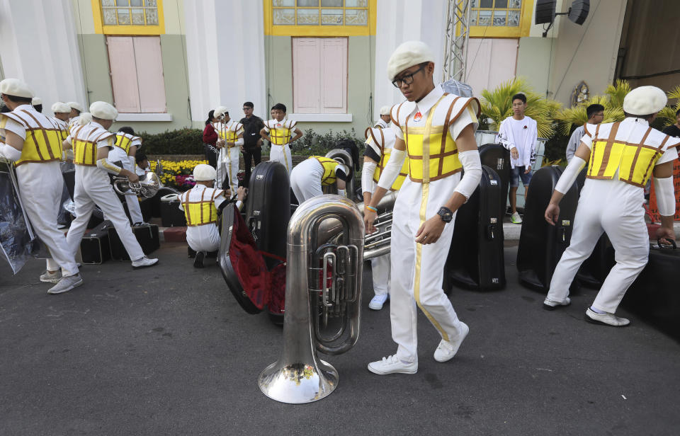 Members of a school band get ready for the rehearsal for Pope Francis holy mass on Thursday at the National Stadium, in Bangkok, Thailand, Wednesday, Nov. 20, 2019. Pope Francis is heading to Thailand to encourage members of a minority Catholic community in a Buddhist nation and highlight his admiration for their missionary ancestors who brought the faith centuries ago and endured persecution. (AP Photo/Manish Swarup)